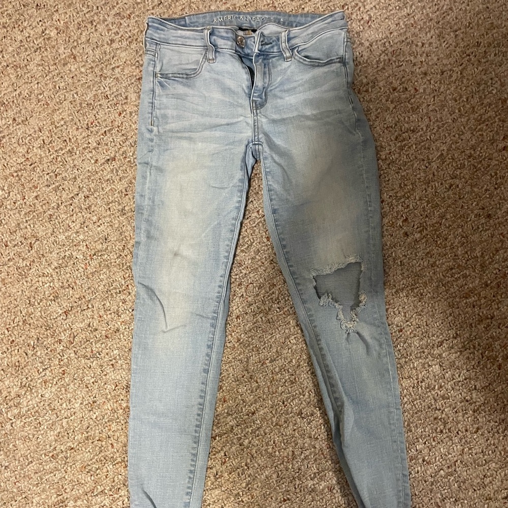 AE distressed skinny jeans light wash
